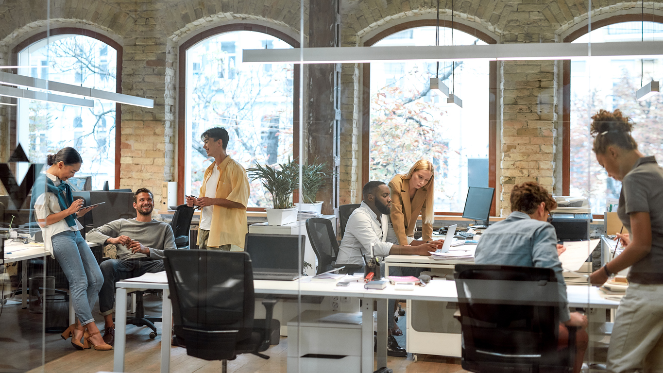 Young mixed-race businesspeople in office