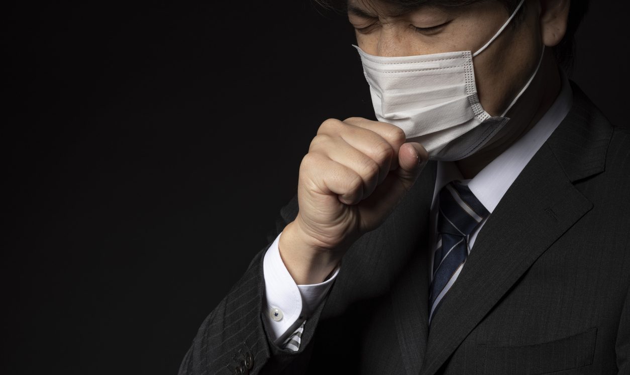 Businessman wearing a medical mask