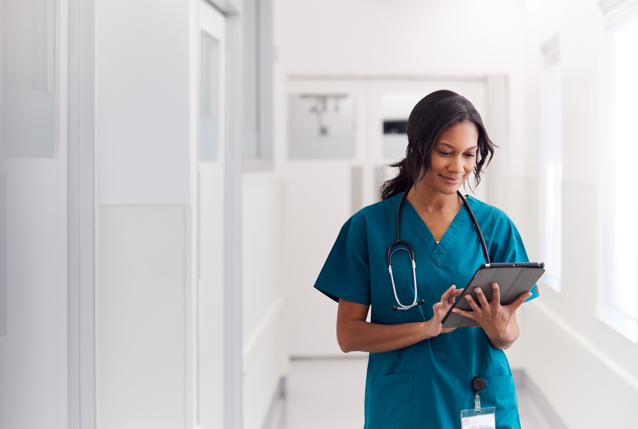 Female physician in a hospital coridor