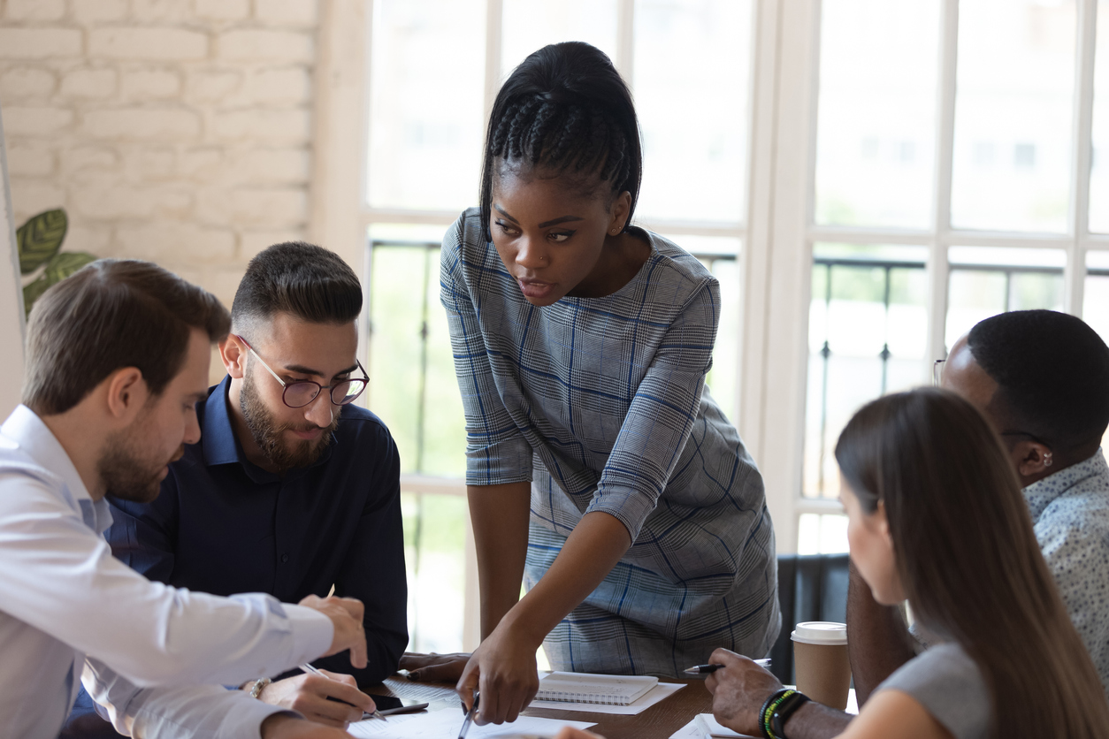 Female business leader speaking in meeting