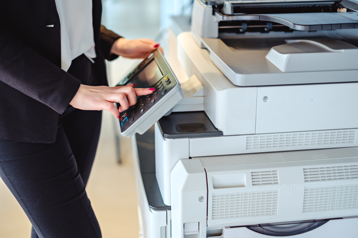 Office worker using printer