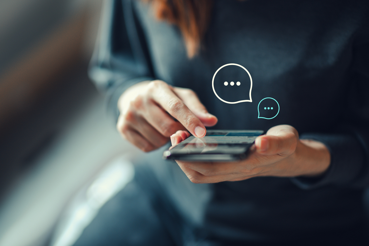 Woman using social media on phone