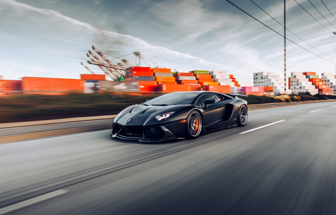 Black Lamborghini on road