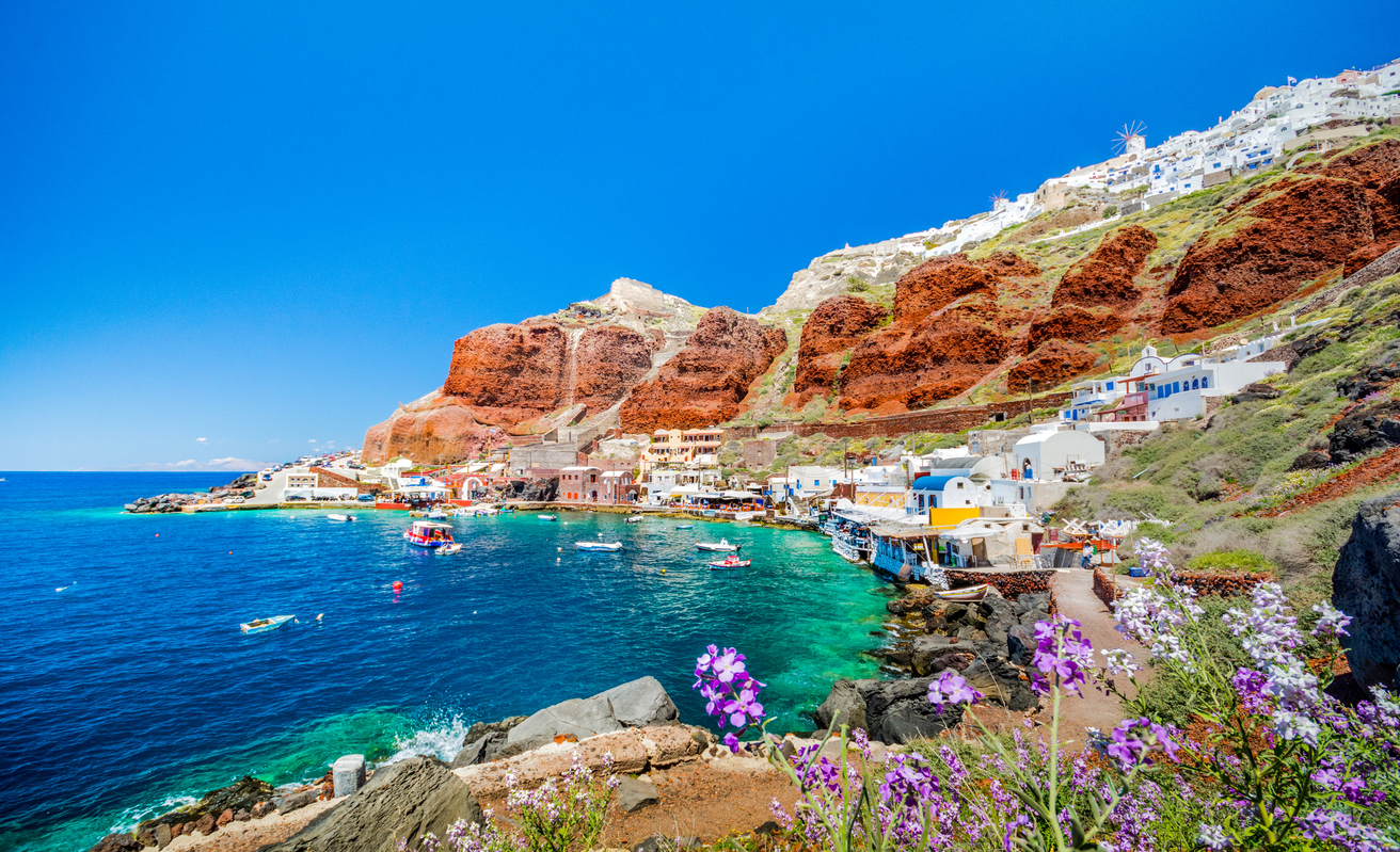 The old harbor of Ammoudi under the famous village of Ia at Santorini, Greece.