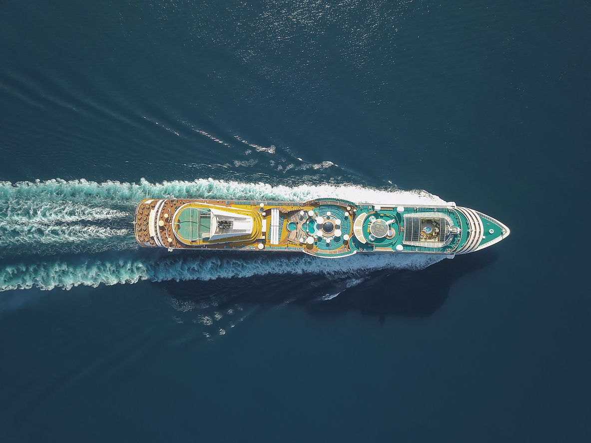 aerial view large cruise ship at sea, passenger cruise ship vessel, sailing across the ksamil, albania. view from drone.