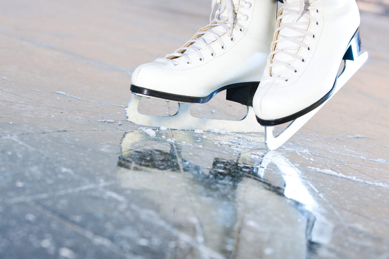 tilted natural version, ice skates with reflection