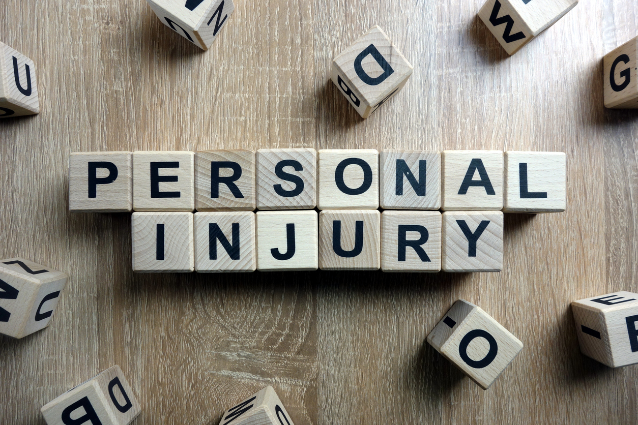 personal injury text from wooden blocks