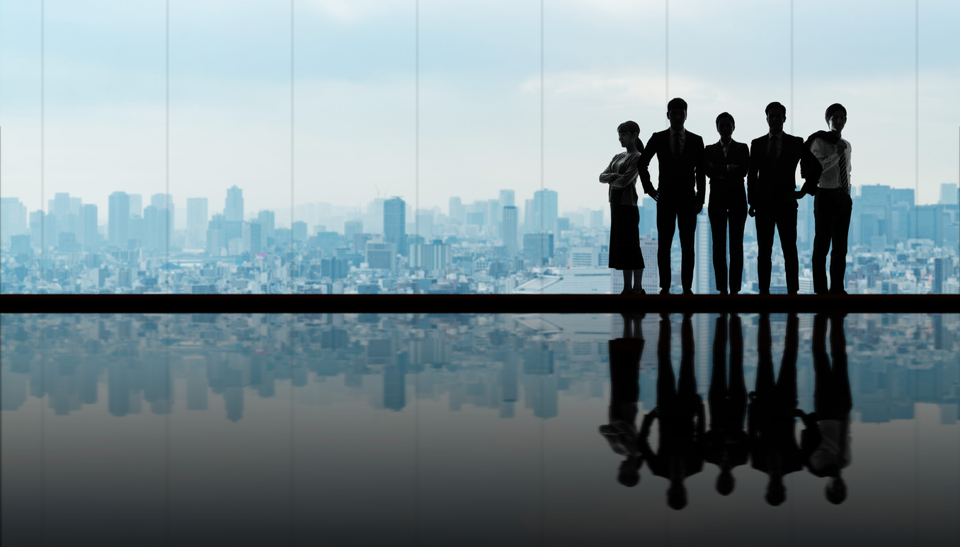 group of businessperson in front of the city.